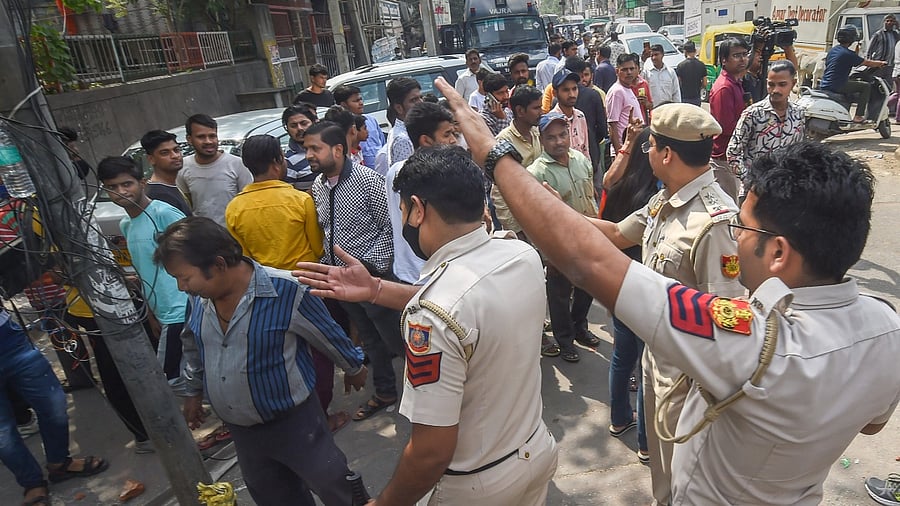 Security personnel keep vigil after clashes broke out between two communities during a Hanuman Jayanti procession on Saturday. Credit: PTI File Photo