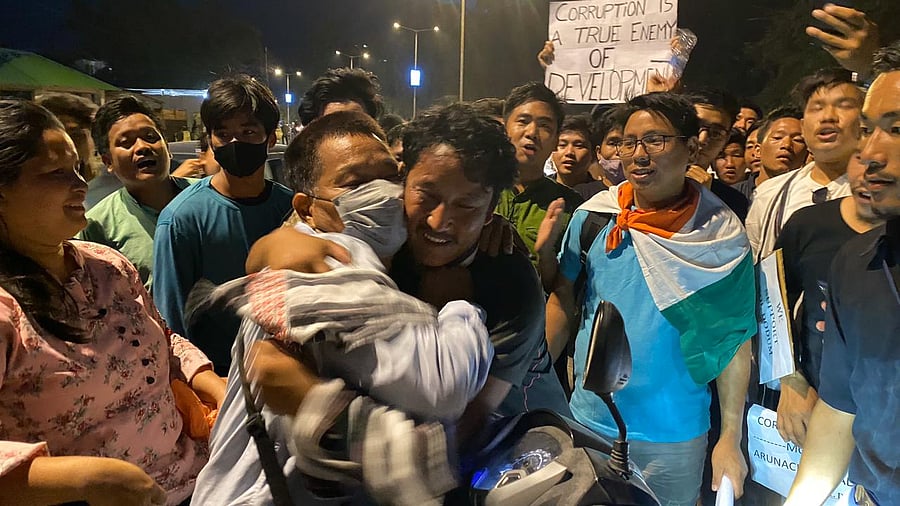 Sol Dodum greeted by the people of his hometown Seppa. Credit: DH Photo/Special Arrangement