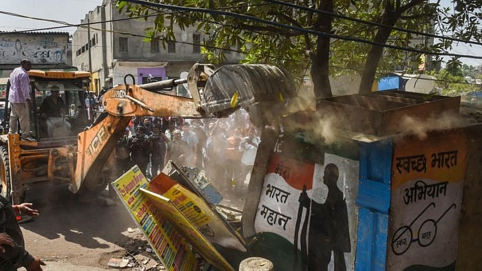 Illegal structures during a joint anti-encroachment drive by NDMC, PWD, local bodies and the police, in the violence-hit Jahangirpuri area, in New Delhi. Credit: PTI File Photo