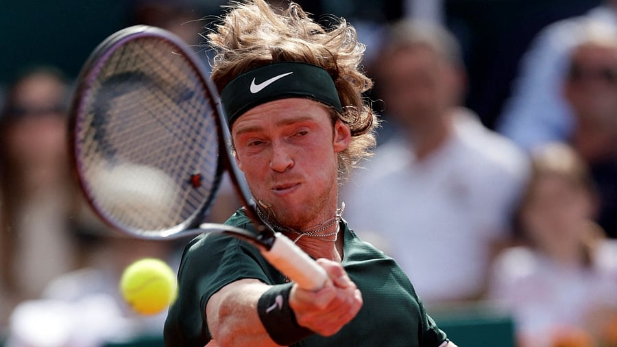 Russia's Andrey Rublev returns the ball to Serbia's Novak Djokovic during their Serbia Tennis Open ATP 250 series tournament final match. Credit: AFP Photo