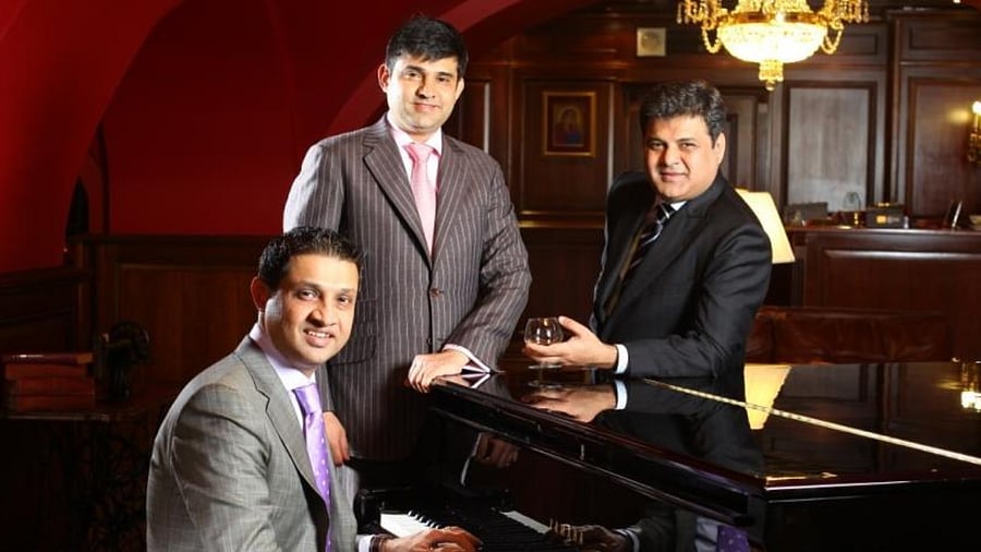 From right to left - Sammy, Jimmy, and Andy Kotwani. Credit: The Imperial Tailoring Company