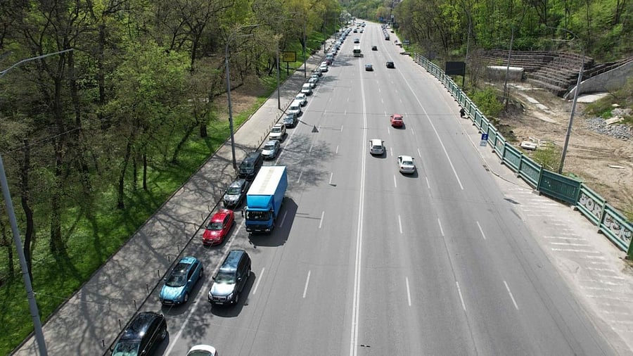 An aerial view shows motorists queuing in their cars at a petrol station in the Ukrainian capital of Kyiv. Credit: AFP Photo