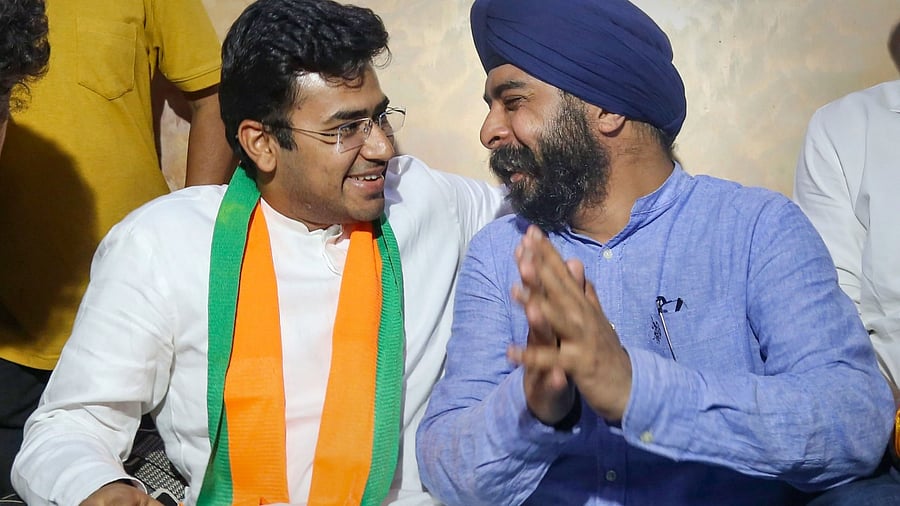 BJP MP Tejasvi Surya meets BJP leader Tajinder Bagga at his residence at Janakpuri. Credit: PTI Photo
