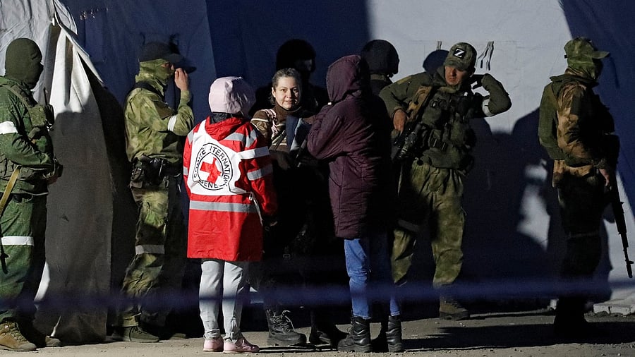 Evacuees from Azovstal steel plant arrive at a temporary accommodation centre in Bezimenne. Credit: Reuters Photo