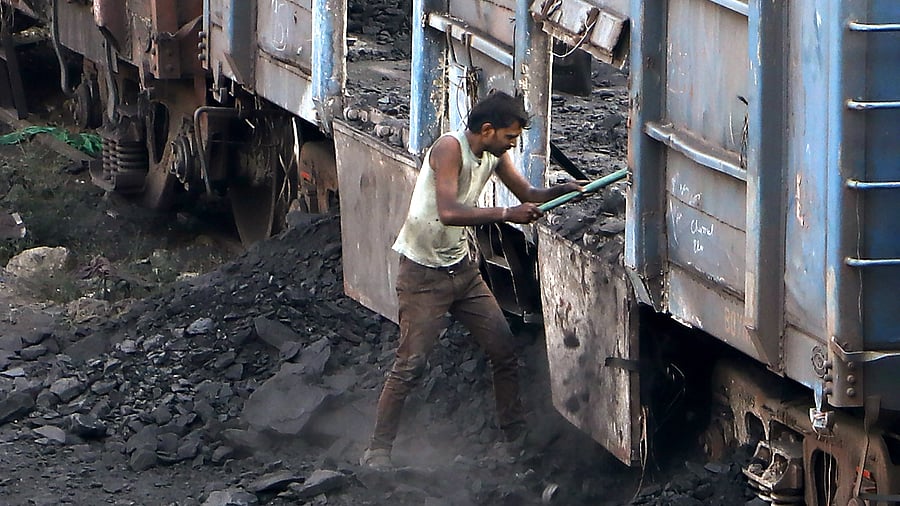 Heavy rain in coal mining areas during last year’s monsoon season hit production and supply. When demand for electricity increased, the states were reluctant to purchase coal from the international market due to soaring prices. Credit: PTI File Photo