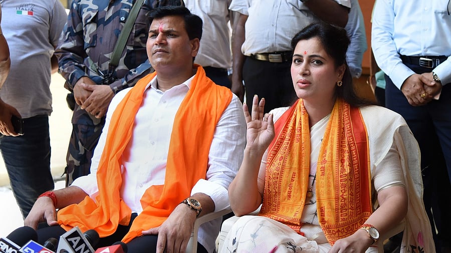Amravati MP Navneet Kaur Rana with husband MLA Ravi Rana. Credit: PTI Photo