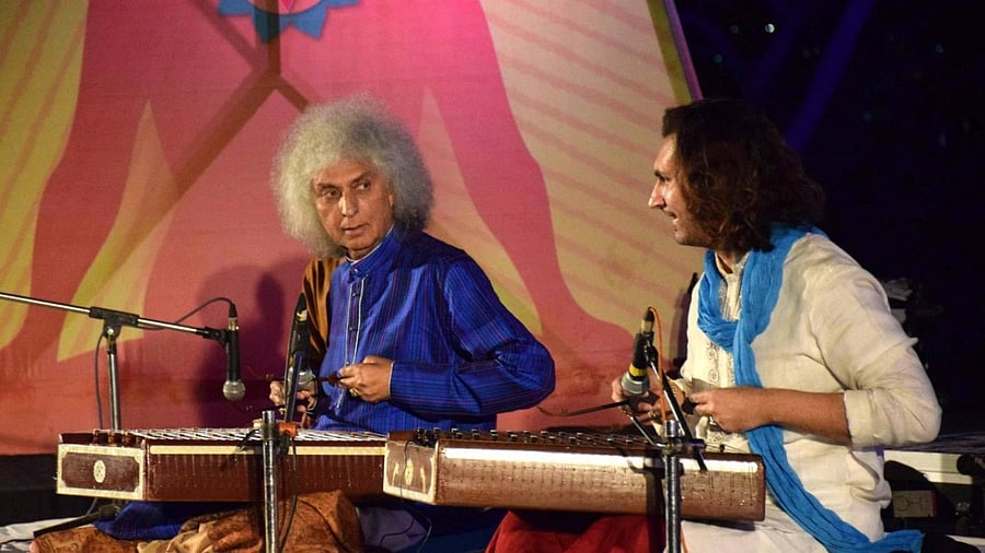 Noted Santoor Player Pandit Shiv Kumar Sharma and his Son Rahul Sharma performing Jon the first day of weeklong cultural programme ‘Niramay’ at Bharat Bhawan in Bhopal. Credit: PTI file photo