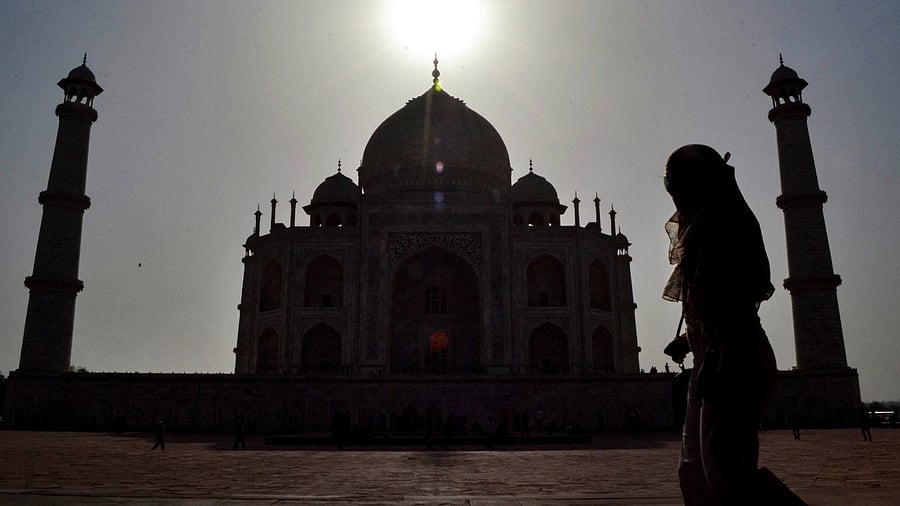 The Taj Mahal being silhouetted against the sunlight on a hot summer day, in Agra. Credit: PTI File Photo