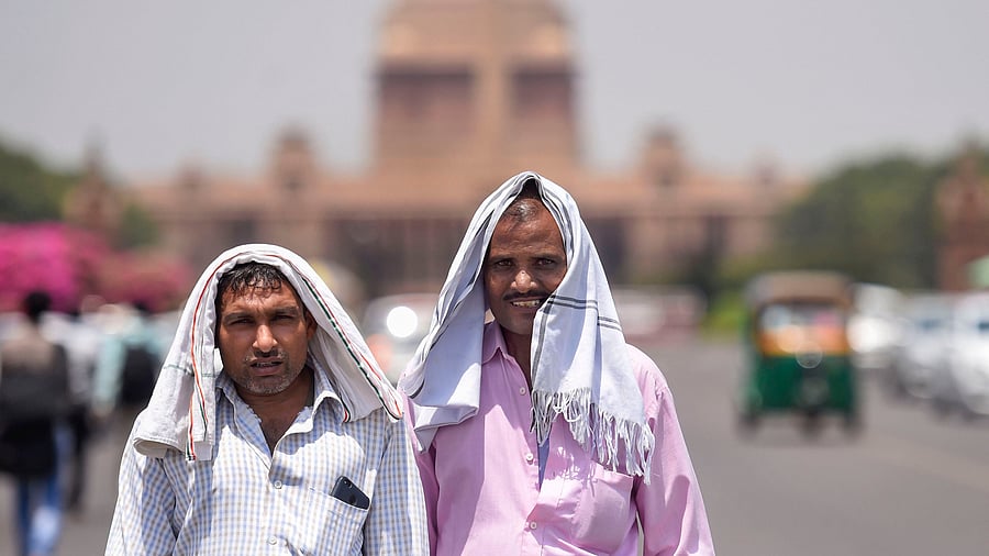 The IMD uses four colour codes for weather warnings -- green (no action needed), yellow (watch and stay updated), orange (be prepared) and red (take action). Credit: PTI File Photo