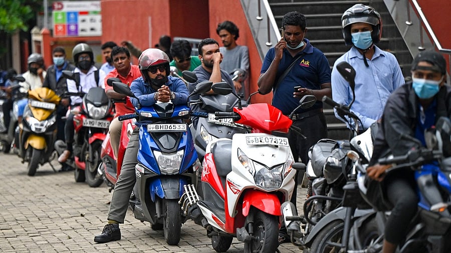 The personal income tax exemption threshold was lowered from 3.0 million rupees ($8,330) a year to 1.8 million rupees. Credit: AFP Photo