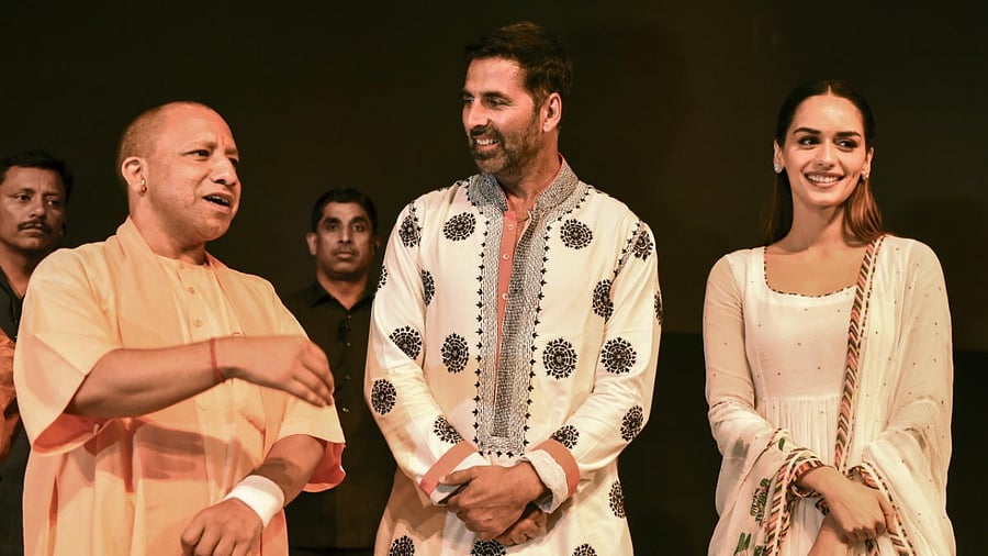 Uttar Pradesh Chief Minister Yogi Adityanath with Bollywood actors Akshay Kumar and Manushi Chhillar after a special screening of the movie 'Samrat Prithviraj' at Lok Bhawan in Lucknow, Thursday, June 2, 2022. Credit: PTI Photo
