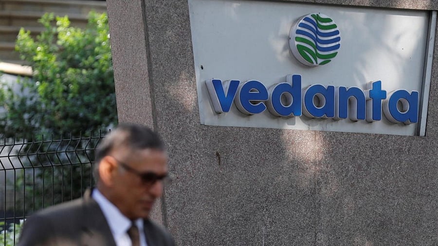 A man walks past the logo of Vedanta outside its headquarters in Mumbai. Credit: Reuters photo