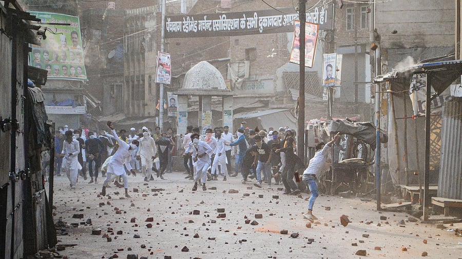The hoardings will also have the contact numbers of Station House Officers and senior police officials so that people can pass on information about suspects to the police. Credit: PTI Photo