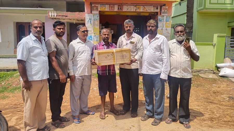 RSS workers in Mandya have sent a parcel containing shorts to Congress office, condemning Siddaramaiah's call to burn khaki shorts all over the state. Credit: IANS Photo