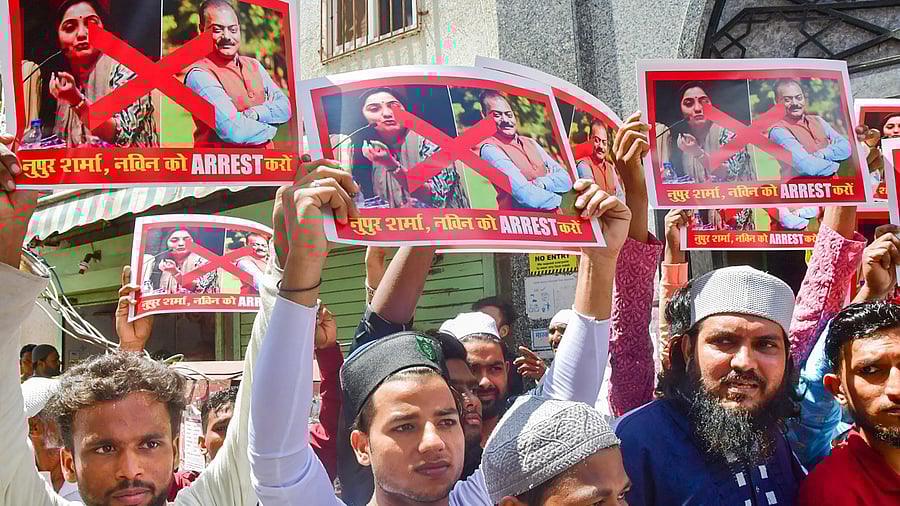 Members of All India Maulayi Mission protest over controversial remarks made by two now-suspended BJP leaders against Prophet Mohammad, outside Ashrafiya Jama Masjid, Friday, June 10, 2022. Credit: PTI Photo