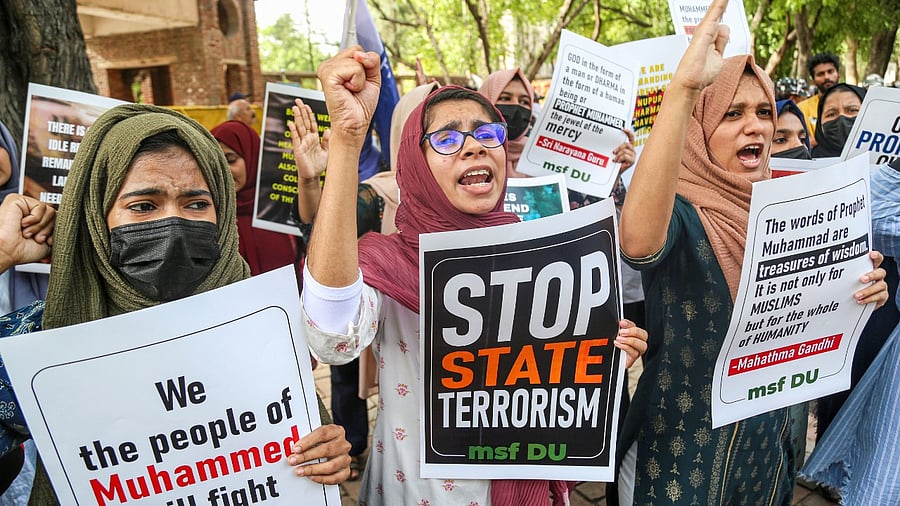 Members of Muslim Students Federation Delhi University stage a protest after two persons from the Muslim community were allegedly killed by police in Ranchi. Credit: PTI Photo