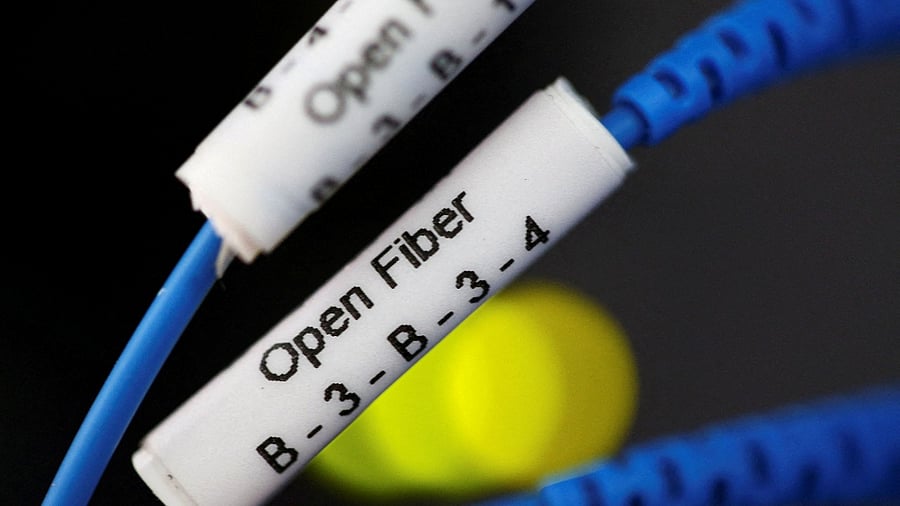Optical fiber cables for internet providers are seen running into a Enel Group server room in Perugia, Italy. Credit: Reuters File Photo