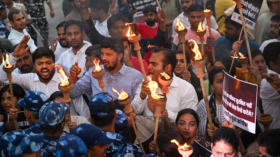 Indian Youth Congress (IYC) members take out a 'Mashal March' against government's newly introduced 'Agnipath' scheme, at Jantar Mantar. Credit: PTI Photo