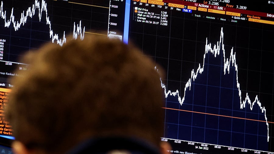 A trader works on the floor of the New York Stock Exchange (NYSE) in New York City. Credit: Reuters Photo