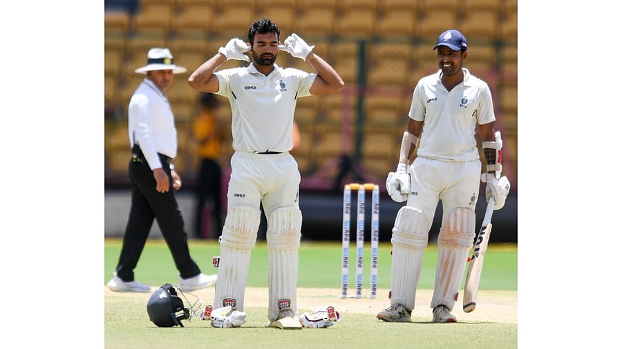 Madhya Pradesh batsman Yash Dubey celebrates his century during the third day of the Ranji Trophy final cricket match between Mumbai and Madhya Pradesh at M Chinnaswamy Stadium, in Bengaluru. Credit: DH Photo
