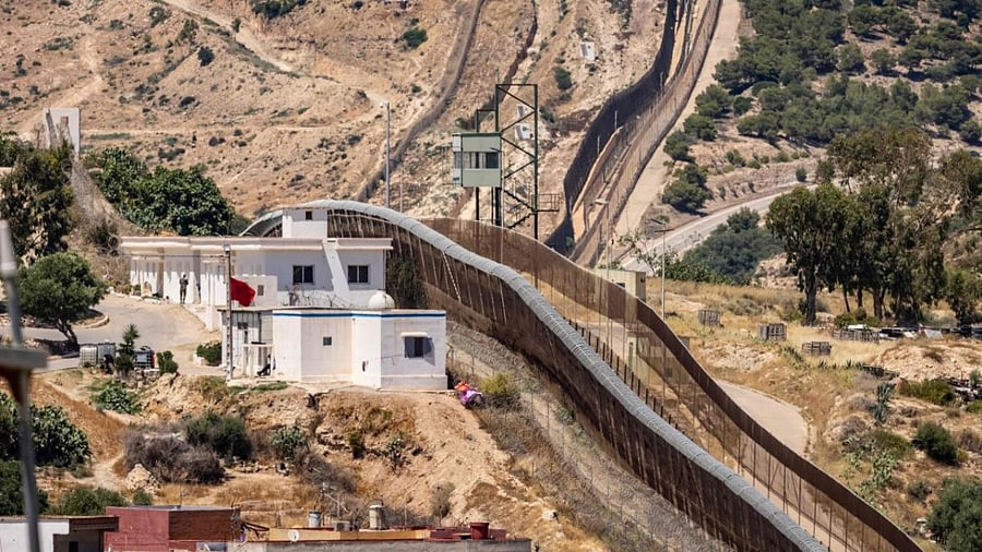 A picture shows a view of the border fence separating Morocco and Spain's North African Melilla enclave, near the Moroccan city of Nador. Credit: AFP Photo