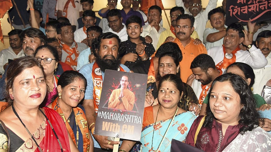 Shiv Sena workers stage a protest against rebel Shiv Sena leader Eknath Shinde. Credit: PTI Photo
