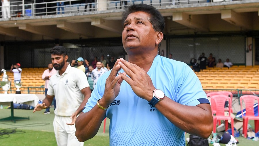 Chandrakant Pandit, an extremely hard taskmaster who literally cracks the whip on erring players. Credit: DH Photo