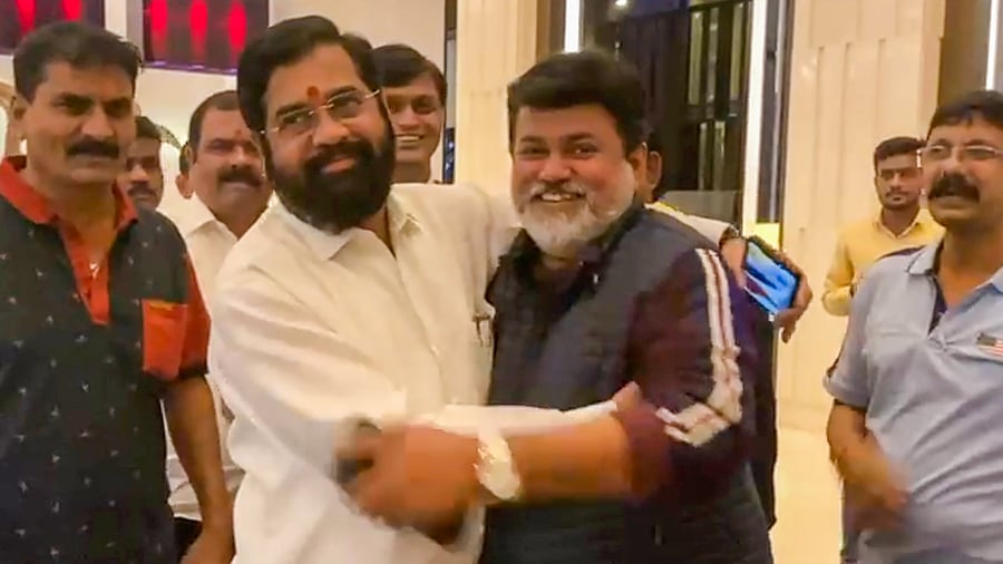  Maharashtra Minister of Higher and Technical Education Uday Samant with rebel Shiv Sena leader Eknath Shinde and other supporting MLAs, at Radisson Blu Hotel in Guwahati. Credit: PTI Photo