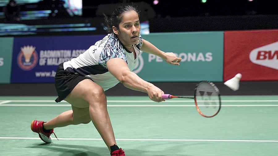 India's Saina Nehwal competes against USA's Iris Wang during their women's singles first round match at Malaysia Open badminton tournament. Credit: AP Photo