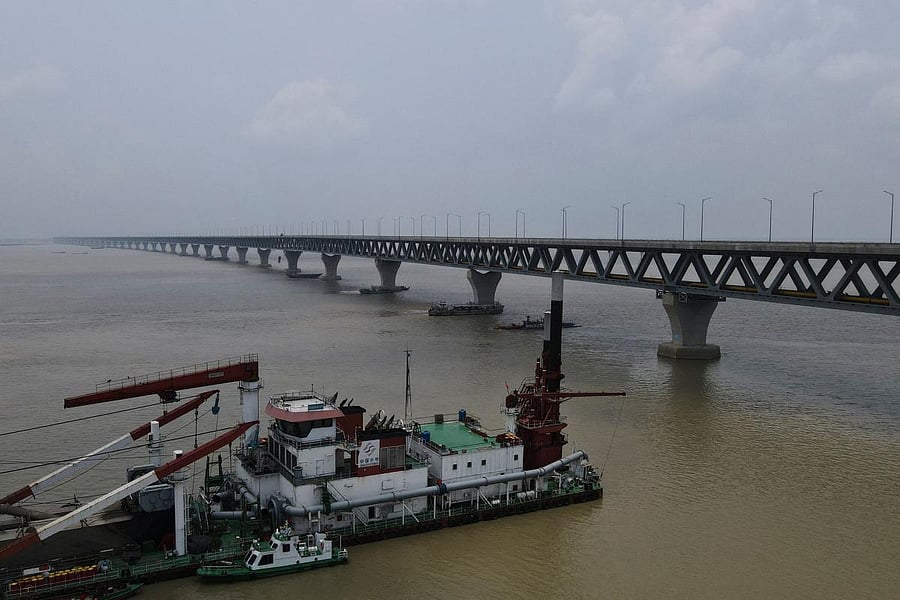 An aerial photograph taken on June 8, 2022, shows a general view of the Padma Multipurpose Bridge and railway project, which is scheduled to open for road crossings on June 26, in Louhajang, some 40 kms from Dhaka. Credit: AFP