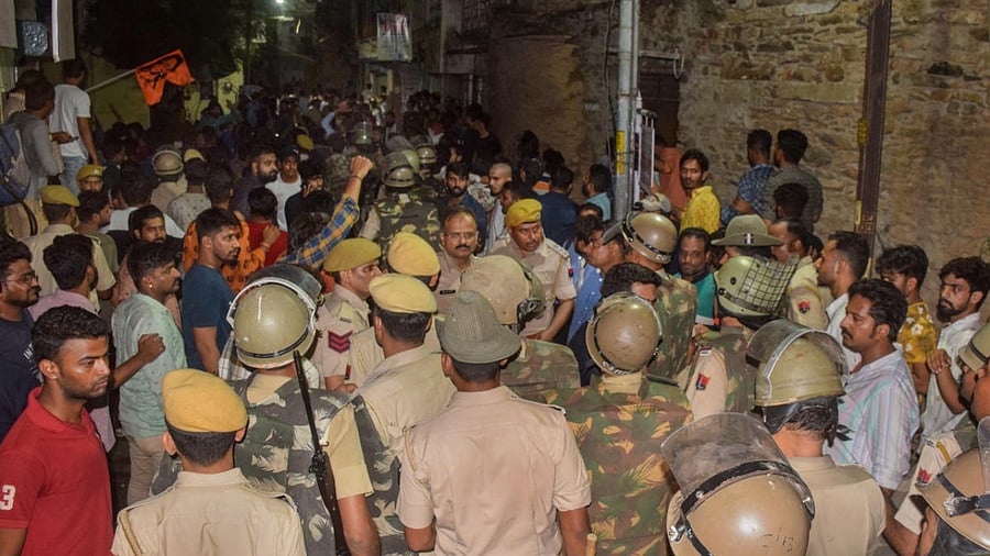 Police at the scene of crime after the murder of a tailor by two men, allegedly over his social media posts, in Udaipur. Credit: PTI Photo
