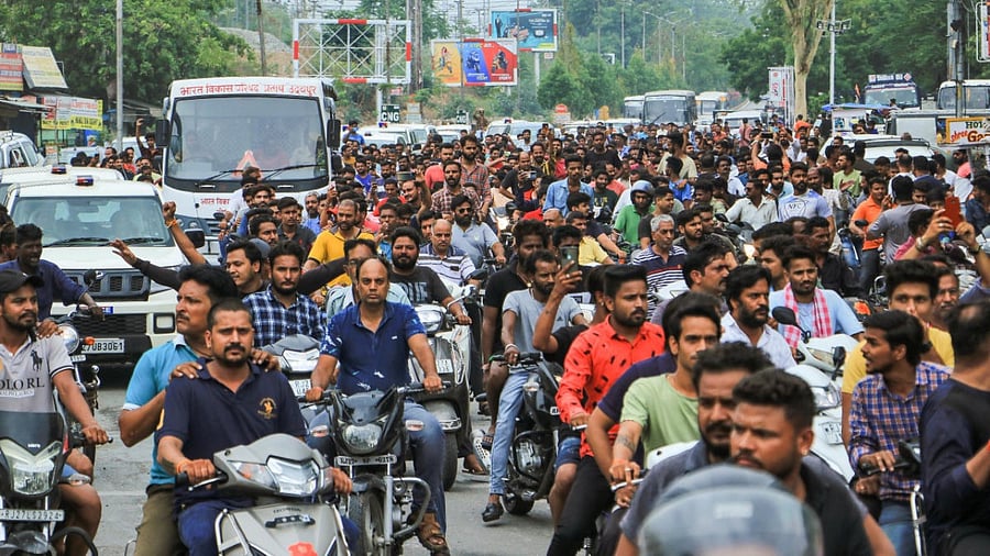 People accompany in large numbers during the funeral procession of tailor Kanhaiya Lal in Udaipur. Credit: PTI Photo