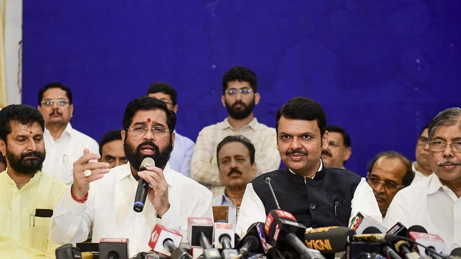 Maharashtra CM-designate and Shiv Sena leader Eknath Shinde and Leader of Opposition and BJP leader Devendra Fadnavis address a press conference, in Mumbai. Credit: PTI Photo