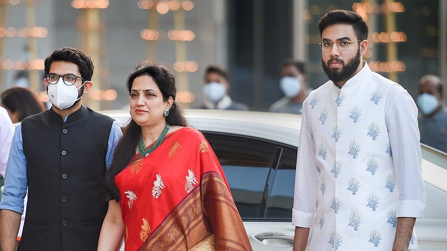 Rashmi Thackeray, wife of Maharashtra CM Uddhav Thackeray, with her sons Aaditya Thackeray and Tejas Thackeray. Credit: PTI File Photo