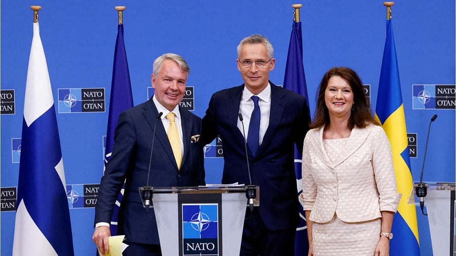 Sweden's Foreign Minister Ann Linde and Finland's Foreign Minister Pekka Haavisto attend a news conference with NATO Secretary General Jens Stoltenberg, after signing their countries' accession protocols at the alliance's headquarters in Brussels. Credit: Reuters Photo