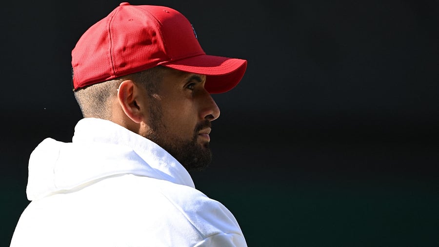 Australia's Nick Kyrgios looks on during the trophy ceremony of his men's singles final tennis match. Credit: AFP Photo