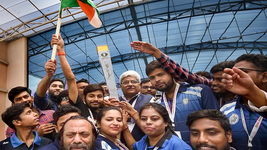 File photo of chess players holding the chess olympiad torch relay in Patna. Credit: PTI Photo