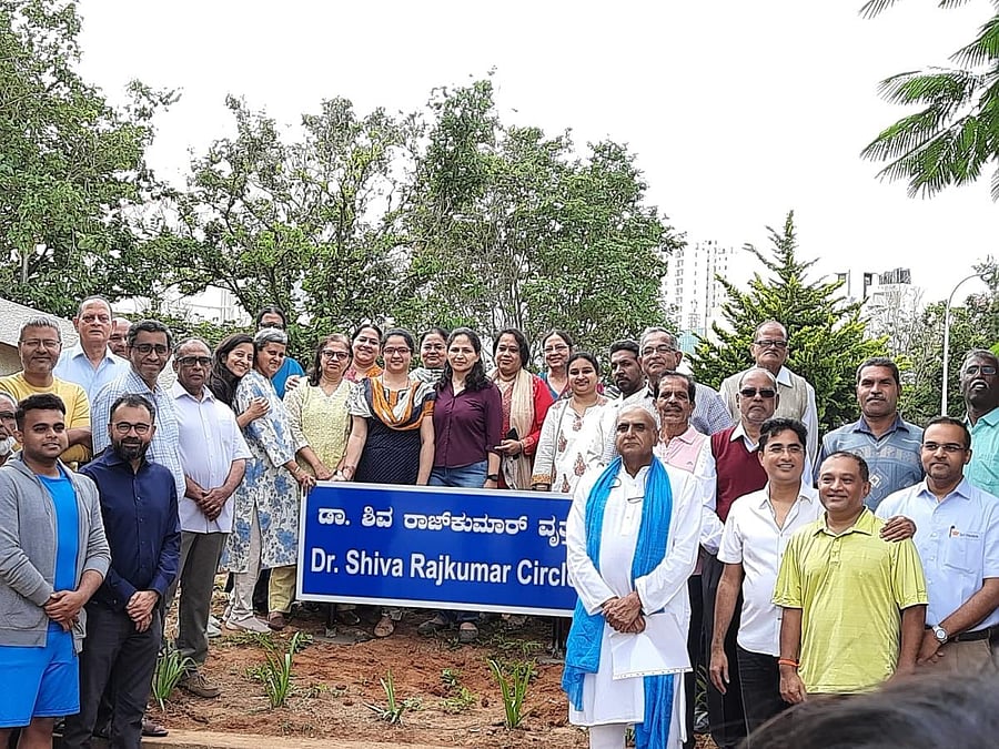 The residents of Manyata Residency at the inauguration ceremony of the Dr Shiva Rajkumar Circle, on Tuesday.