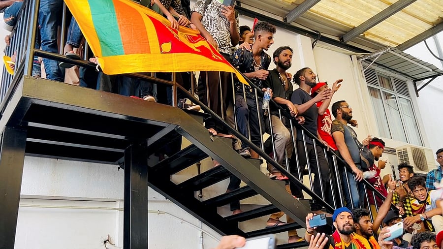 People protest at Sri Lanka's Prime Minister Ranil Wickremesinghe's office, amid the country's economic crisis, in Colombo. Credit: Reuters Photo