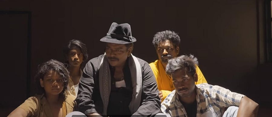 Parthiban shines with his cold humour and wordplay.