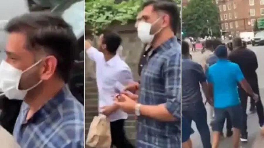 Fans chase Dhoni, take running selfies with him in London. Credit: IANS Photo