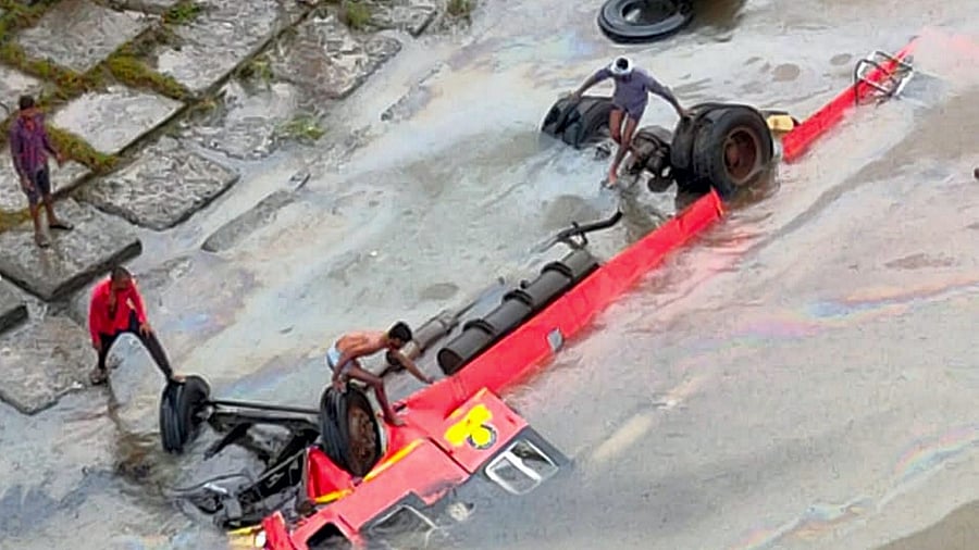 Rescue operation underway after a Maharashtra State Road Transport Corporation (MSRTC) bus fell into the Narmada river. Credit: PTI Photo
