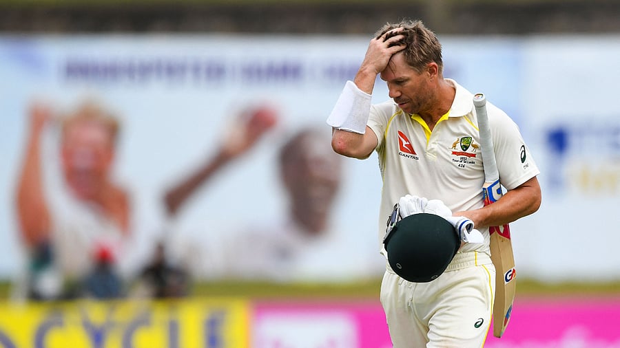 David Warner walks back to the pavilion after his dismissal during the second Test against Sri Lanka, July 11, 2022. Credit: AFP File Photo