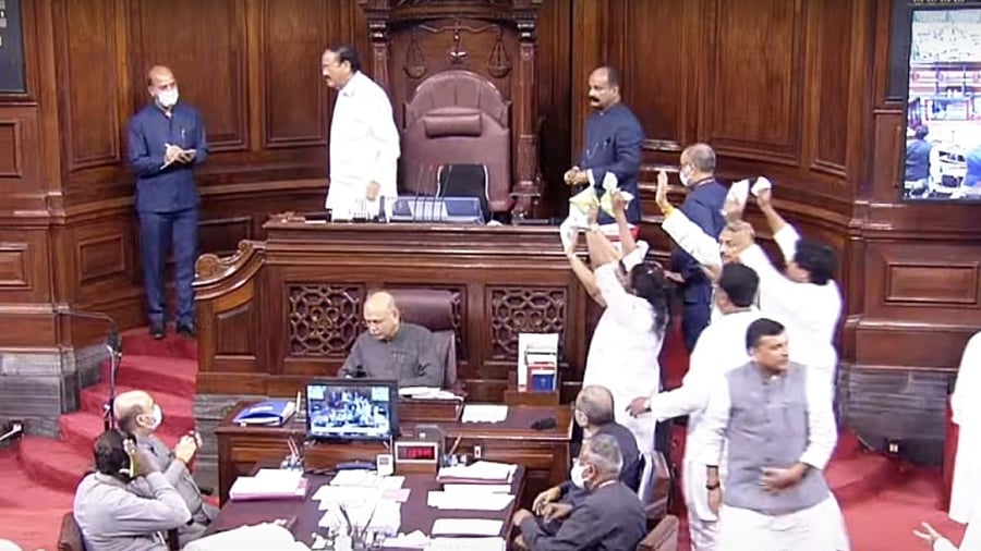 Opposition MPs protest in Rajya Sabha against inflation and GST hike in essential items, during the Monsoon Session of Parliament, in New Delhi on Wednesday, July 20, 2022. Credit: IANS Photo