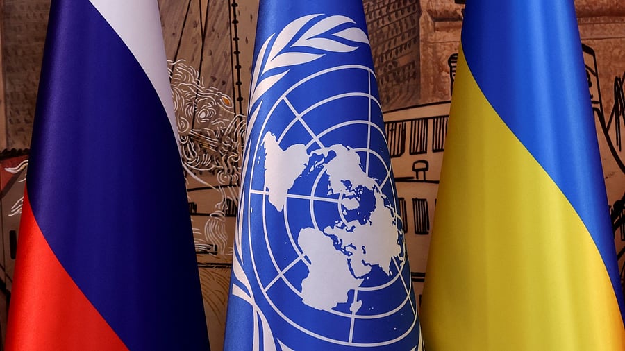 Flags of Russia, the United Nations and Ukraine are seen on the day of a signing ceremony in Istanbul. Credit: Reuters Photo