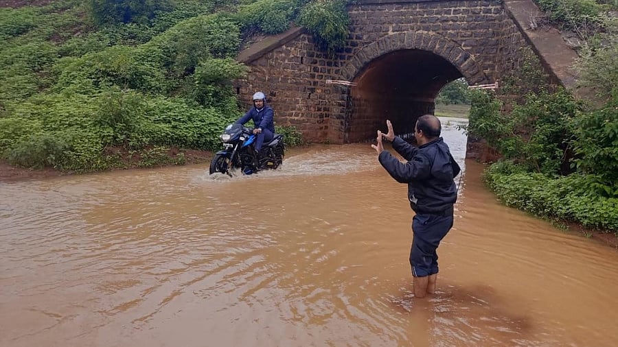 Rain water floods a road in Teachers Colony, Bidar, on Saturday. Credit: Special arrangement