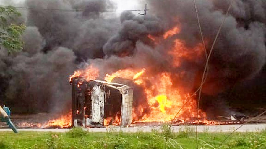 A fuel tanker is on fire after it overturned at a curve near Kanavi in Harapanahalli taluk of Vijayanagara district on Sunday. Credit: Special arrangement