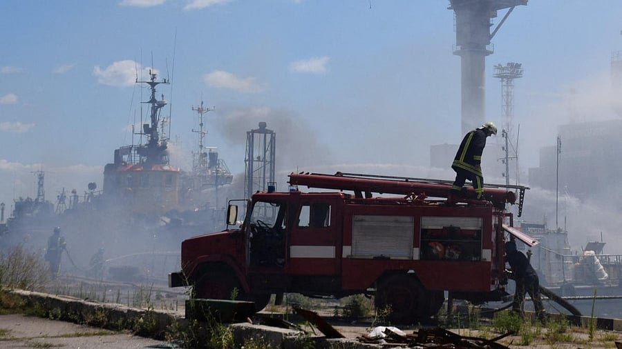 Firefighters work at a site of a Russian missile strike in a sea port of Odesa, as Russia's attack on Ukraine continues. Credit: Reuters photo
