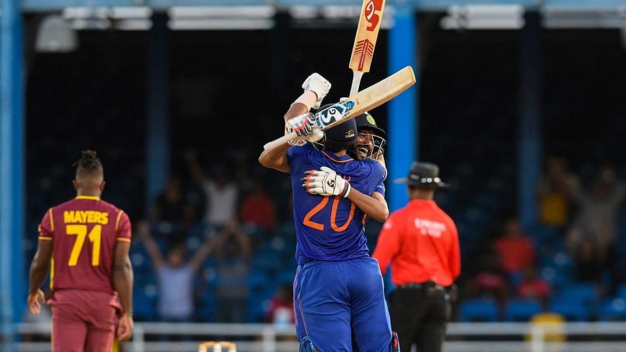 Axar Patel and Mohammed Siraj celebrate winning the 2nd ODI match between West Indies and India at Queens Park Oval, Port of Spain. Credit: AFP Photo