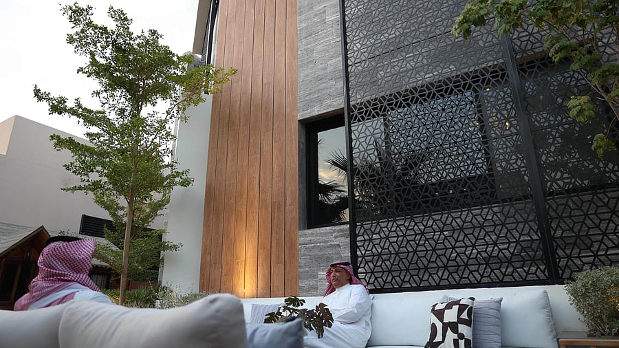 Madini decided to open things up, adding a street-facing patio, redoing the exterior walls in limestone and installing soft lighting in the entryway. Credit: AFP Photo